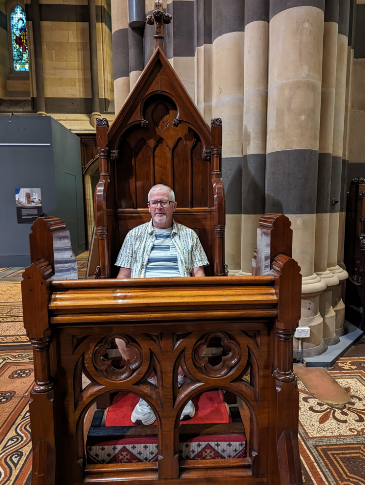 Dad sitting upon the Archbishop's seat