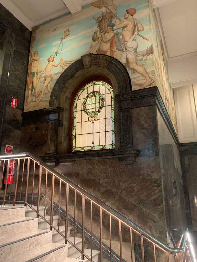 Viewing the stairs and artwork on a State Library tour