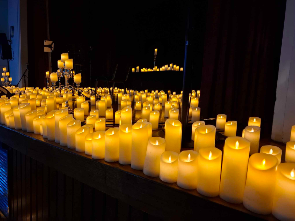 Thousands of lit candles along the stage, Candlelight Concerts Melbourne