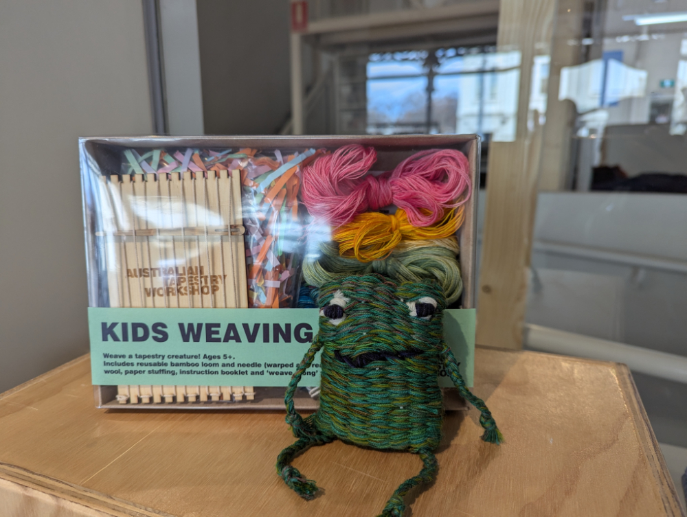 Close up image of a kids weaving kit using yarn Australia