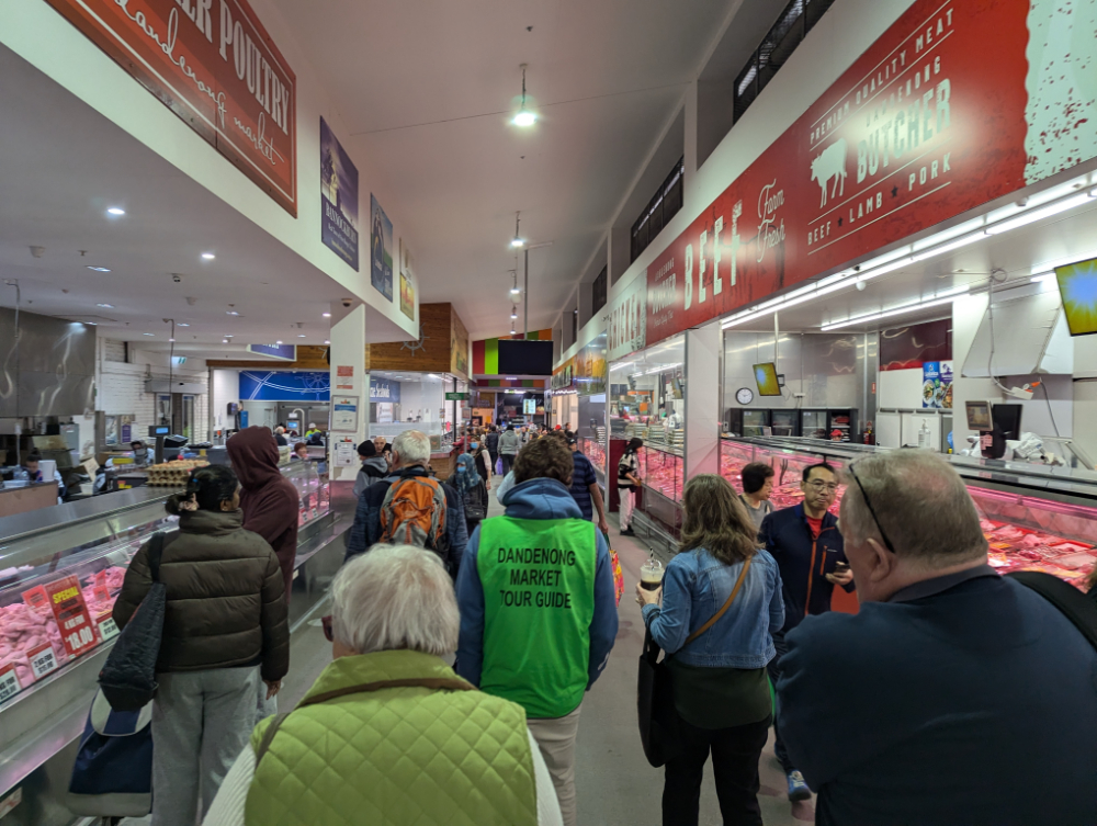 Image of people gathering at the market as part of best discounts for seniors week