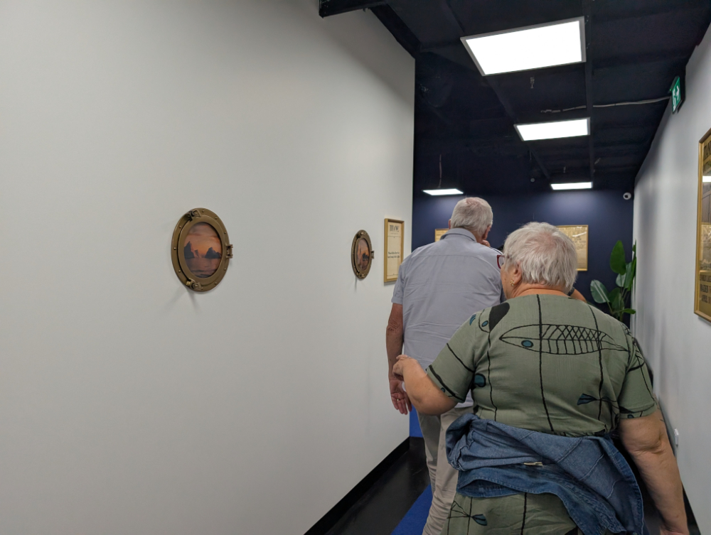 Walking through the corridor to wait to board the ship