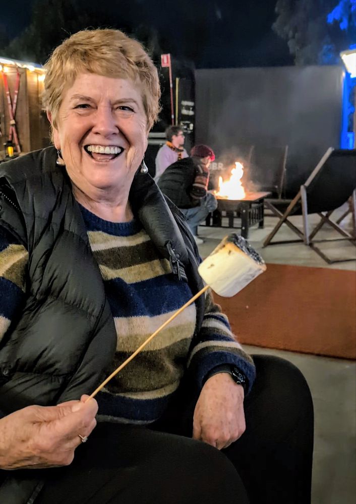Marjie enjoys roasted marshmallows - image by Amy Gardner