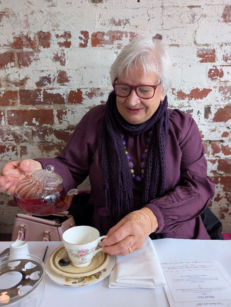 Terrie enjoying tea at Mary Eats Cake, image by Amy Gardner